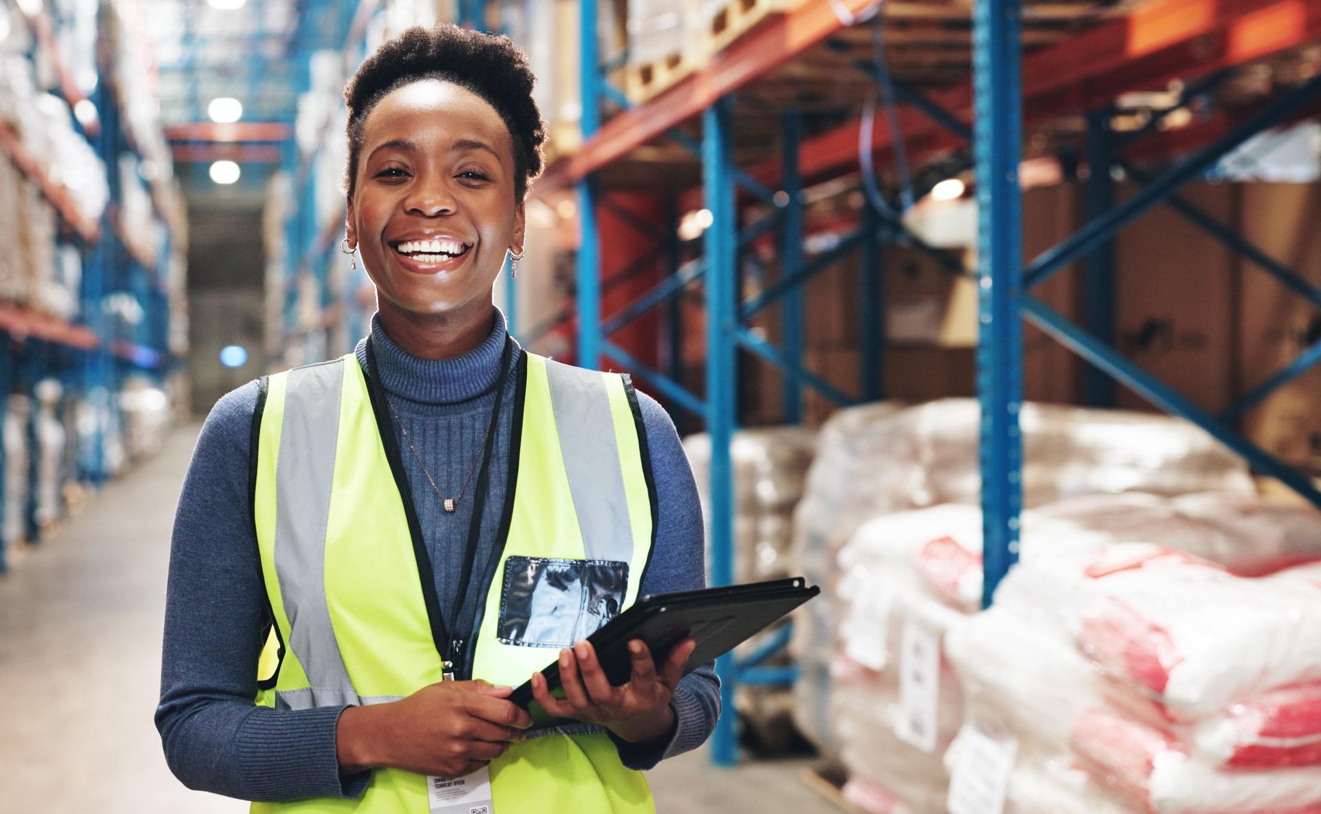 Black woman, portrait and tablet in warehouse for inspection, inventory check and stock management for web. Logistic, employee or supervisor with digital for shipping order, quality control and smile